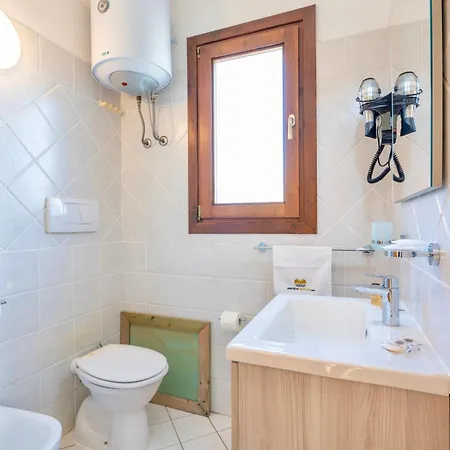 Apartahotel With Swimming-pool In Badesi, With Air Conditioning And Private Outdoor Area