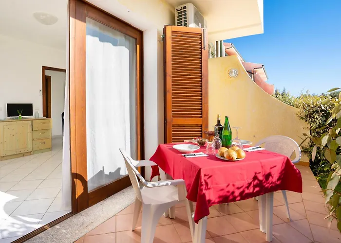 Apartahotel With Swimming-pool In Badesi, With Air Conditioning And Private Outdoor Area 3*
